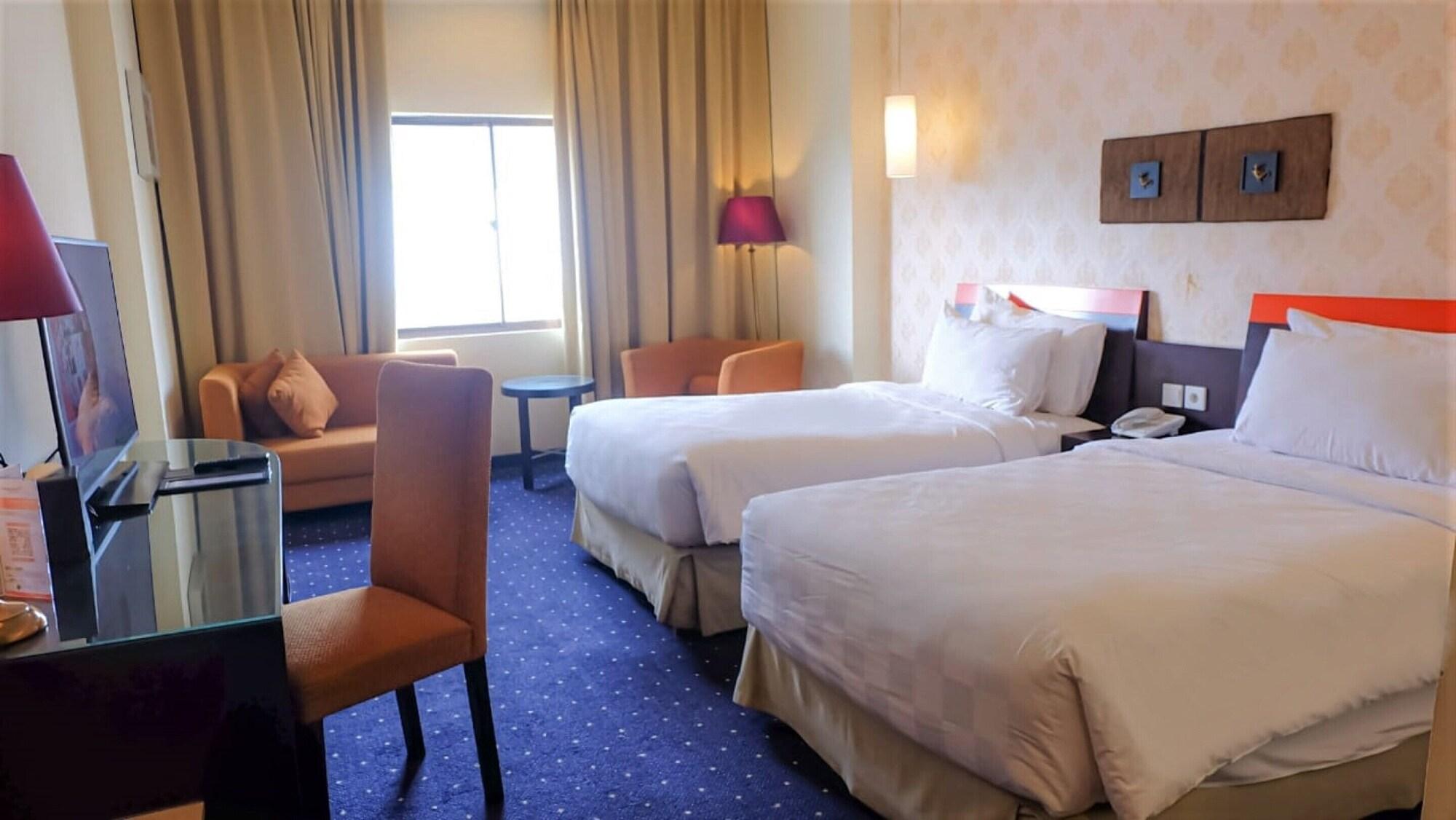 Swiss-Belhotel Silae Palu Exterior photo